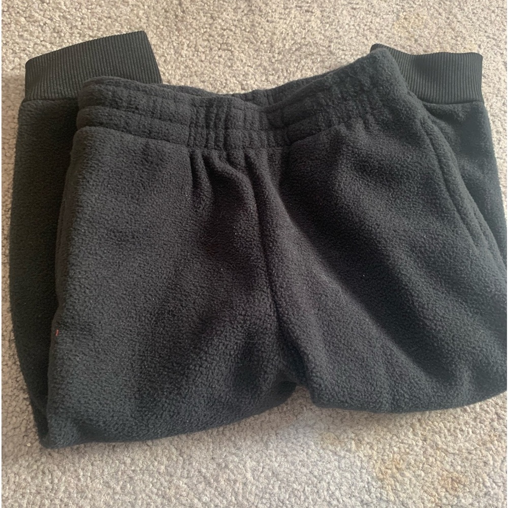 2 baby pants one black and the other navy blue